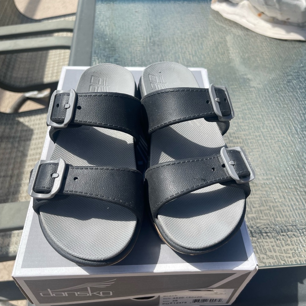 Dansko Black Slide Sandals with Silver Buckles